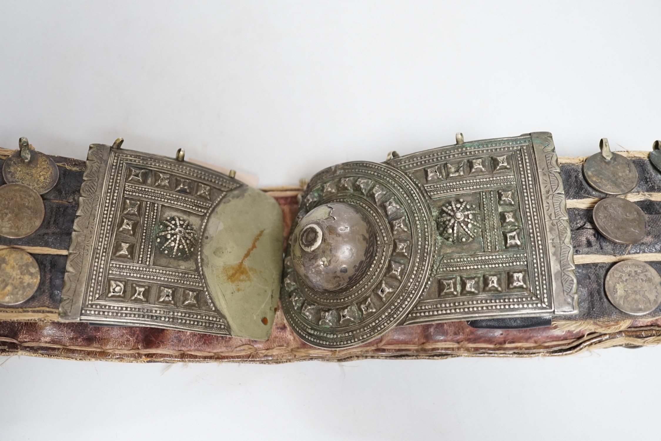 A 19th century Afghan belt, Russian coin mounted